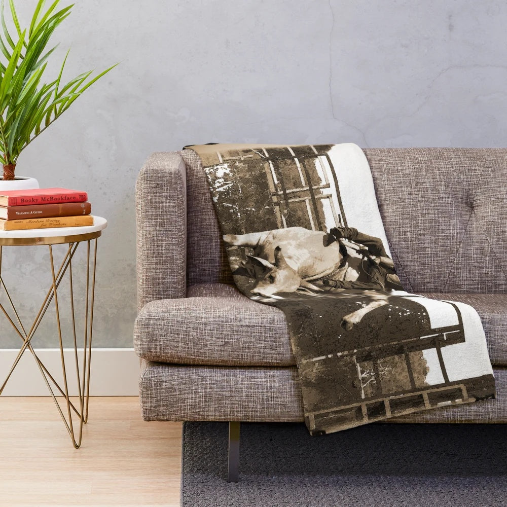 Plush blanket with bull rider, rodeo quotes, and rough stock riders design