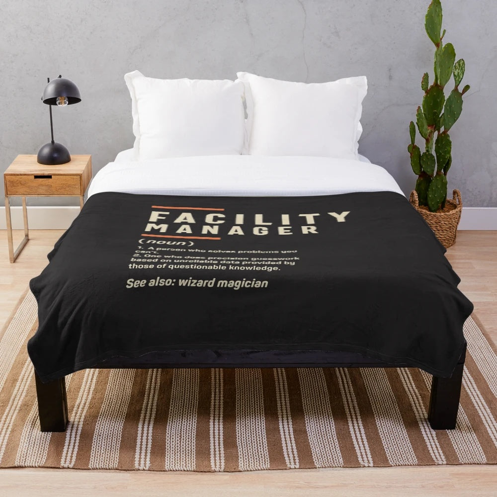 Plush blanket with "Facility Manager Definition" design