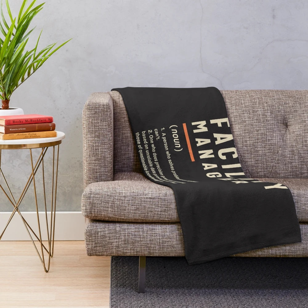 Plush blanket with "Facility Manager Definition" design