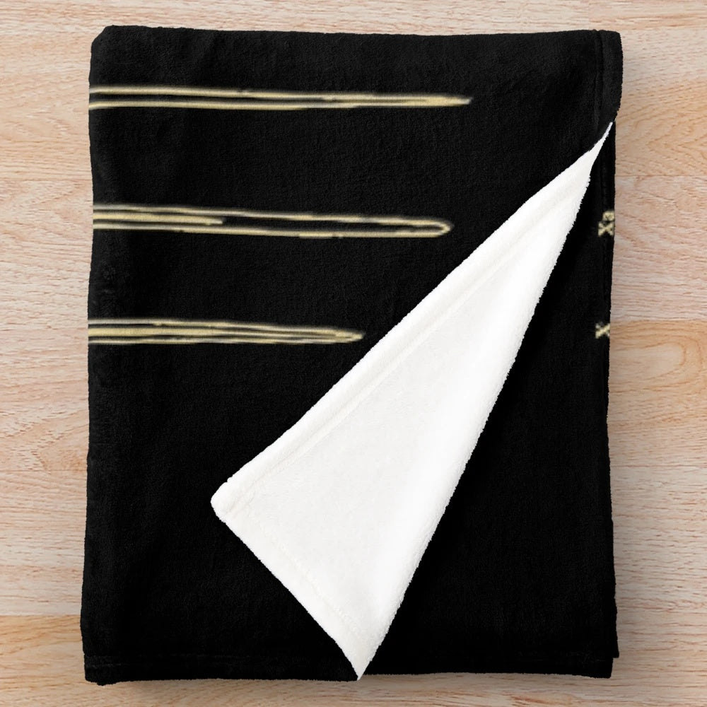 Plush blanket featuring designs inspired by historical swords
