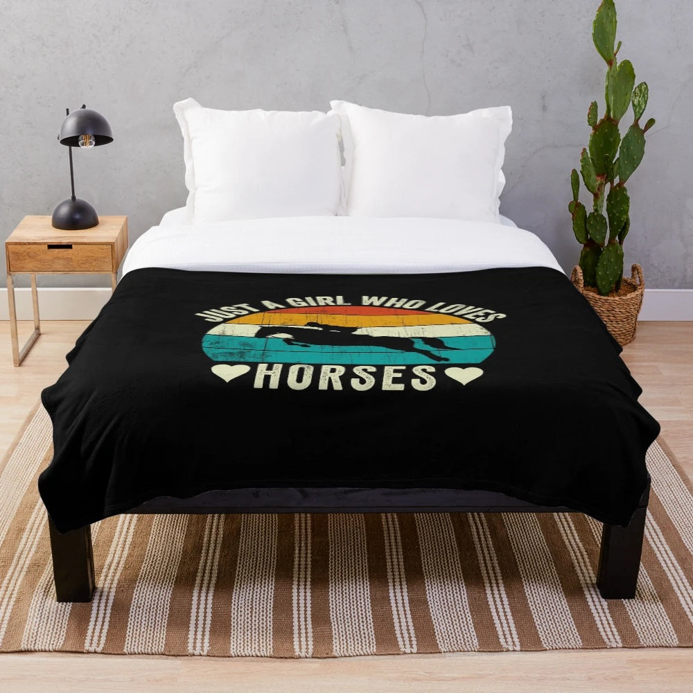 Plush blanket with "Just a Girl Who Loves Horses" design