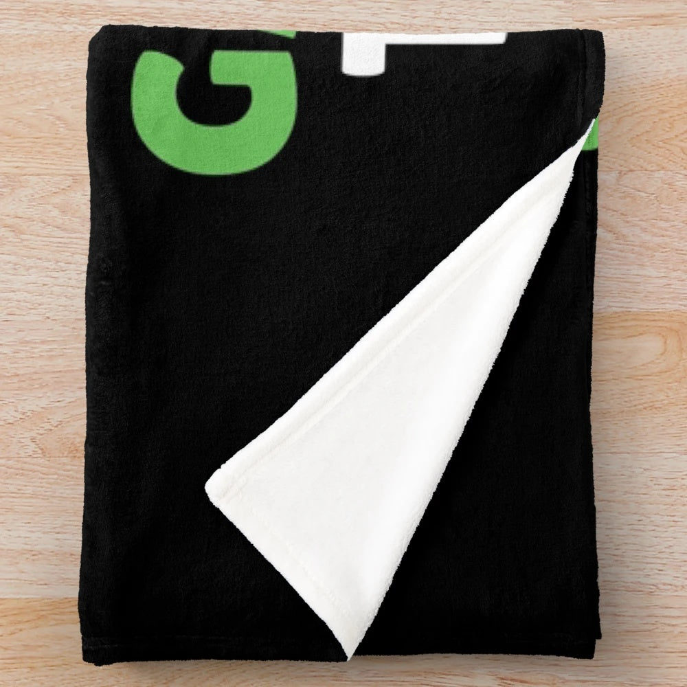 Plush blanket with a design of a young boy who loves garbage trucks