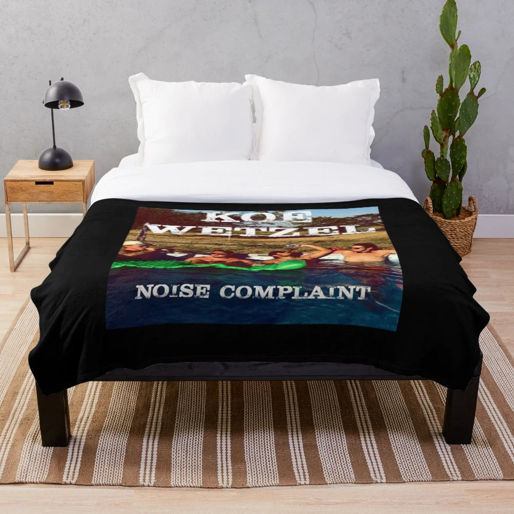 Soft, cozy plush blanket featuring Koe Wetzel's name and logo for country music enthusiasts