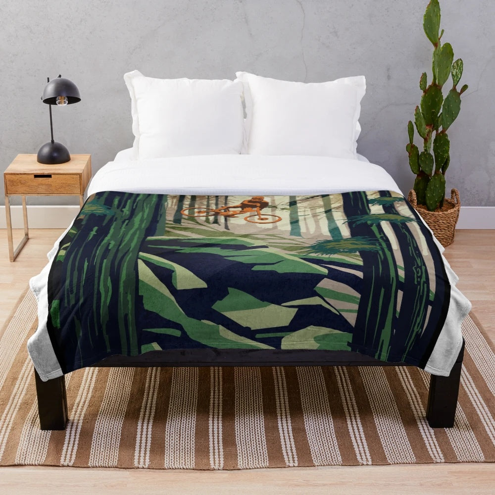 Mountain biking plush blanket featuring retro cycling artwork