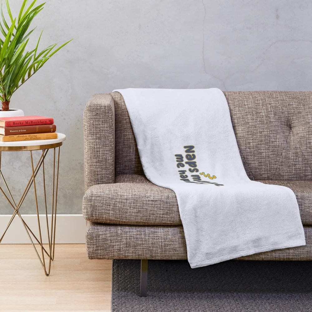 Plush blanket with "Sorry, I Was Sleeping" text for napping and relaxation