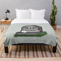 Plush blanket with skull and text "RIP: My Old Hobbies