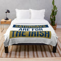 Plush blanket with "Saturdays Are For The Irish" design, featuring Notre Dame Fighting Irish graphics