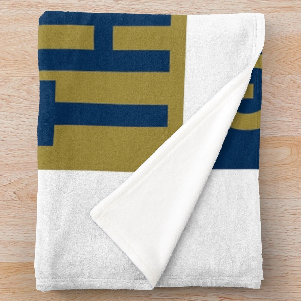 Plush blanket with "Saturdays Are For The Irish" design, featuring Notre Dame Fighting Irish graphics