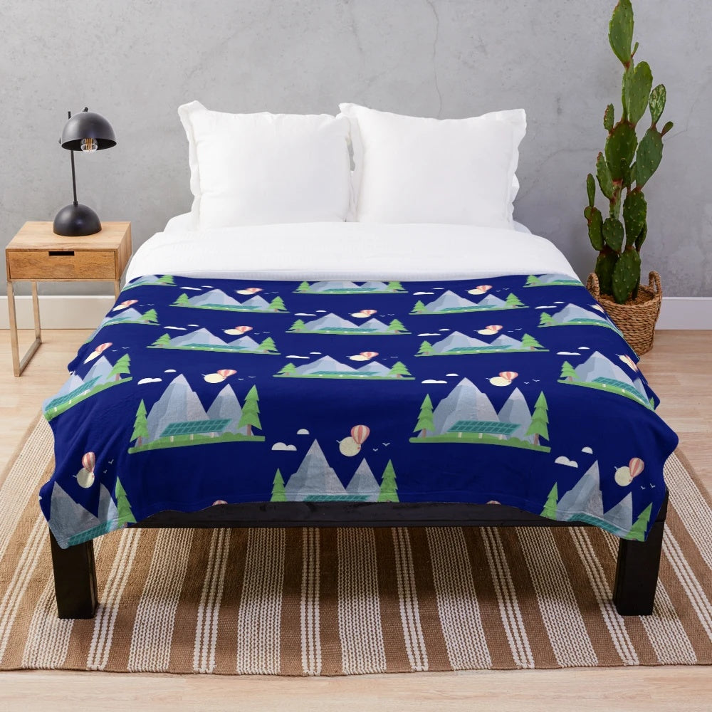 Plush mountain and paragliding themed blanket
