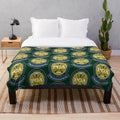Plush blanket featuring PGA TOUR golf imagery and branding