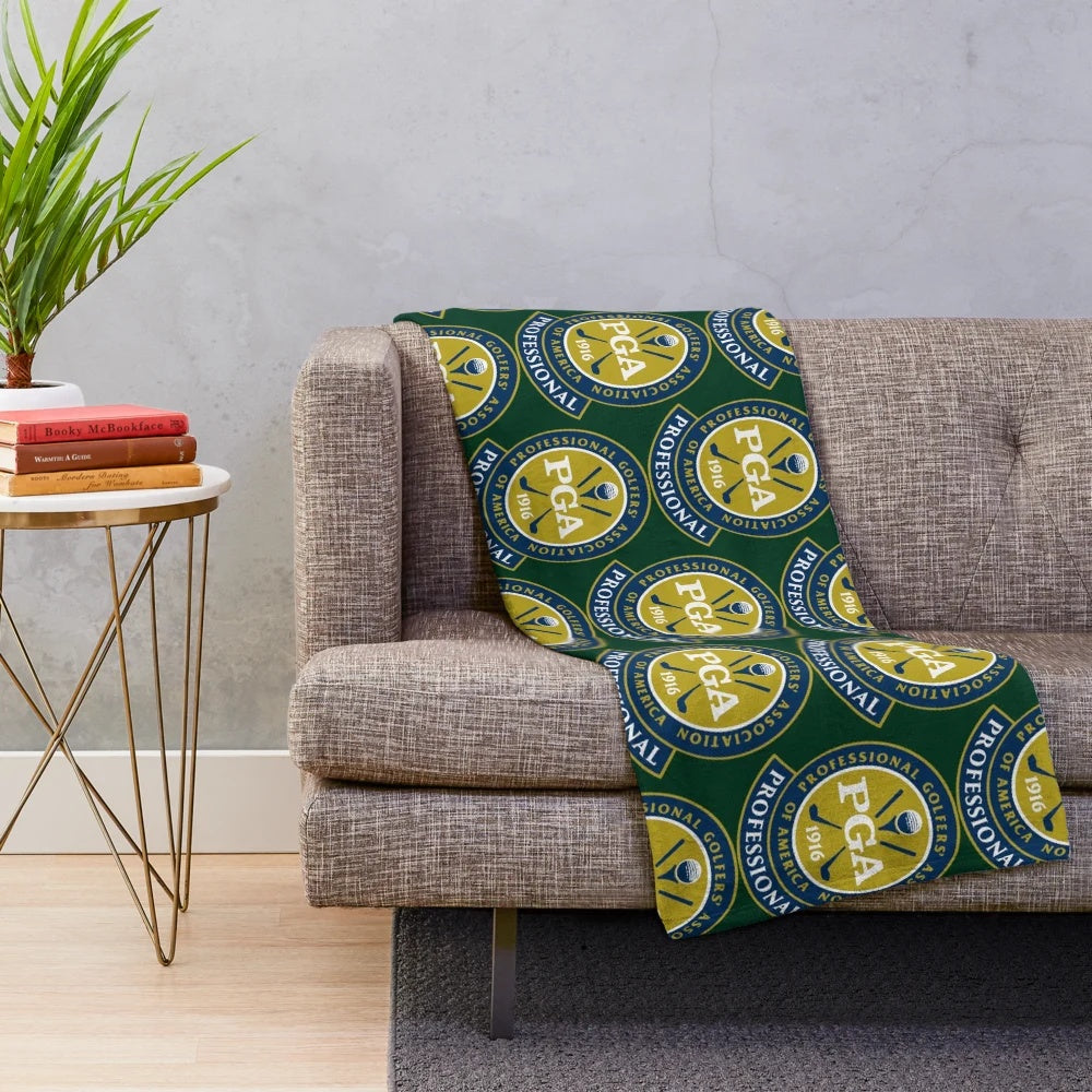 Plush blanket featuring PGA TOUR golf imagery and branding