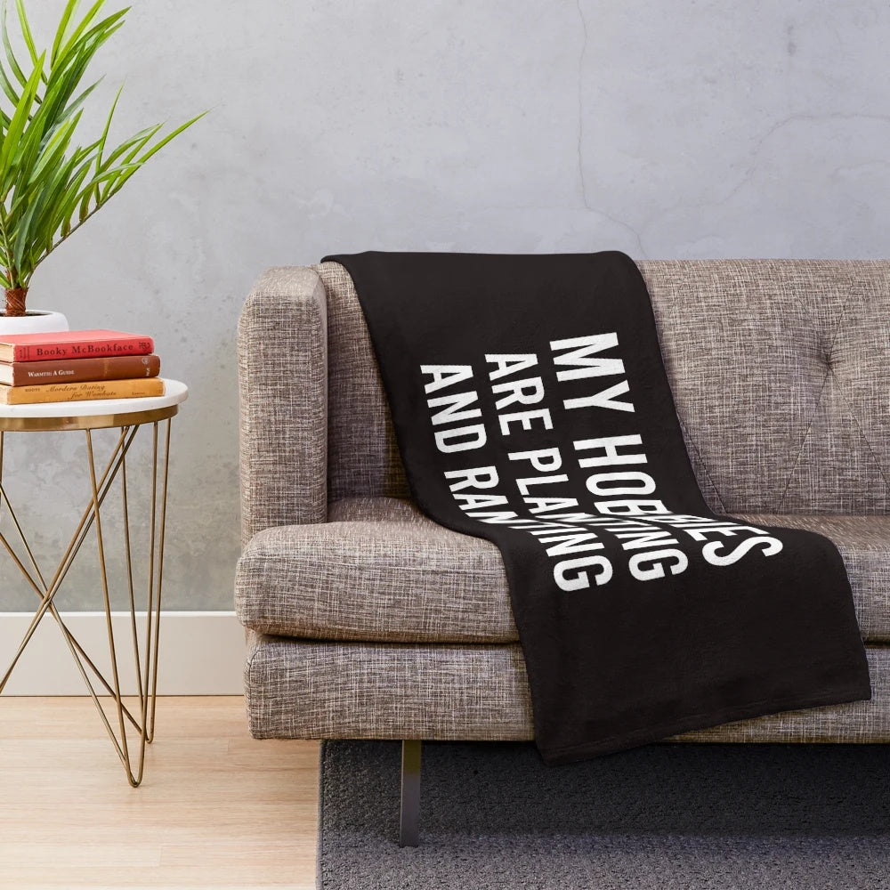 Plush blanket with "My Hobbies Are Planting and Ranting" design