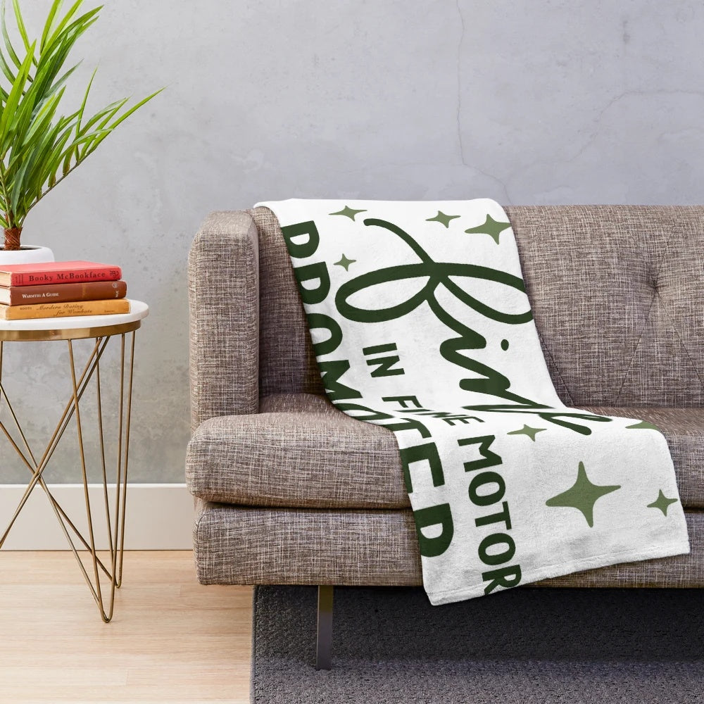 Plush blanket for improving fine motor skills and sensory integration