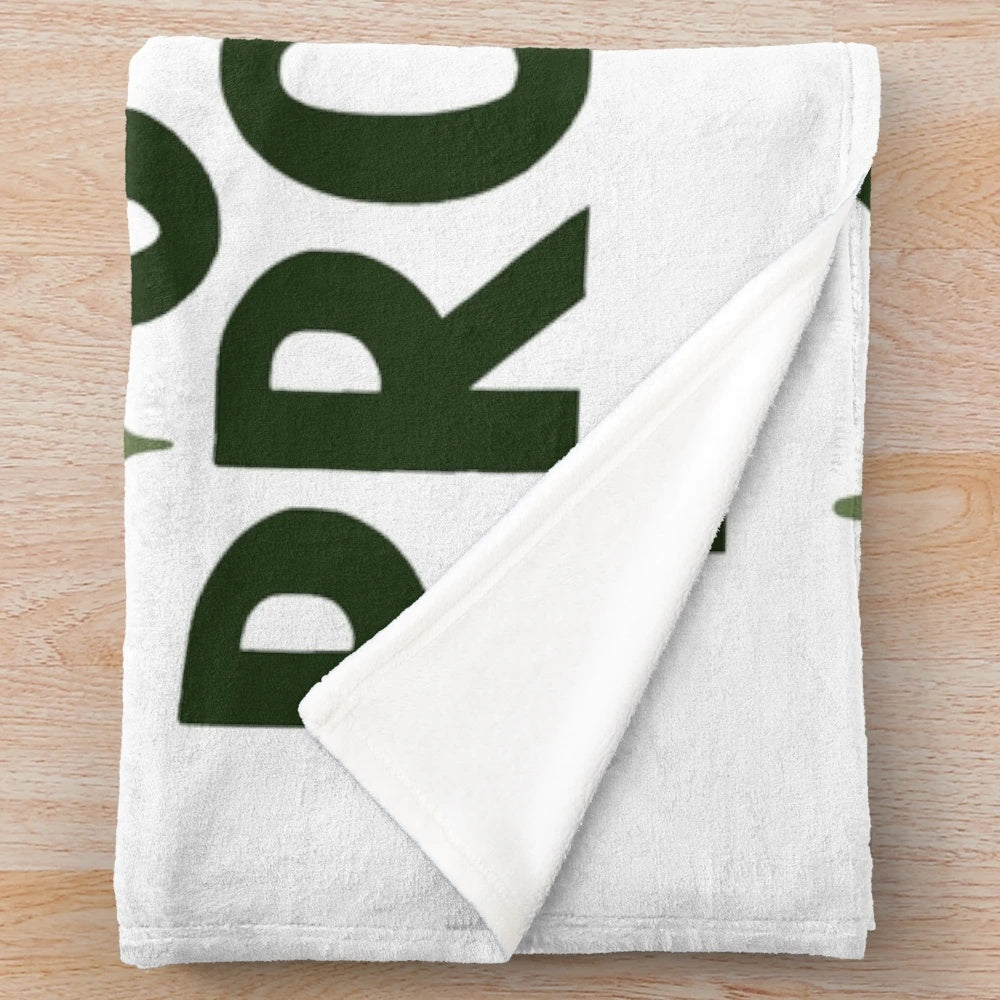 Plush blanket for improving fine motor skills and sensory integration
