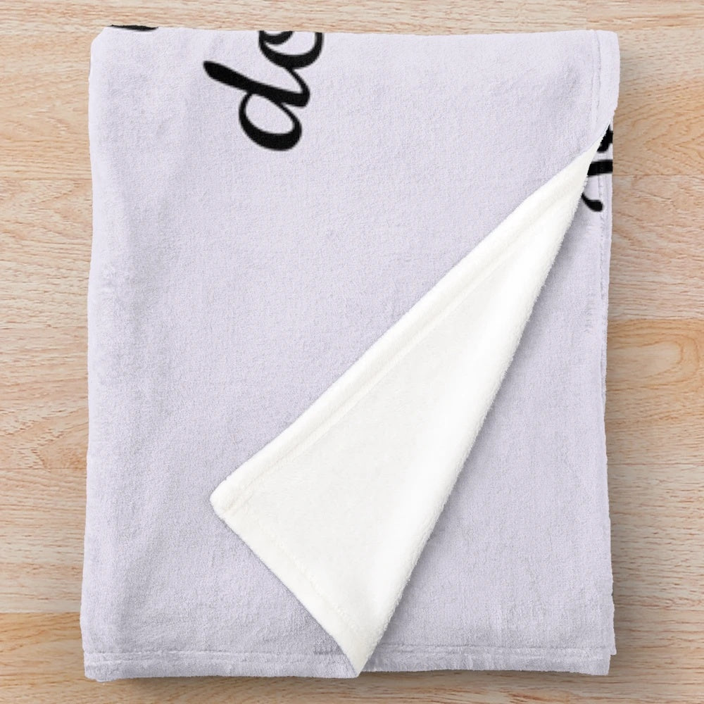 Plush blanket with a "real love" design