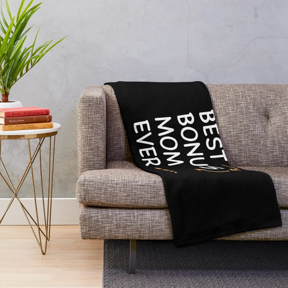 Soft, comfortable plush blanket with "Best Mom" design