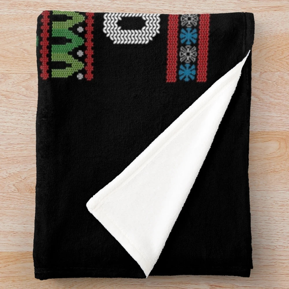 Plush blanket with the text "World's Okayest Preschool Teacher Off Duty