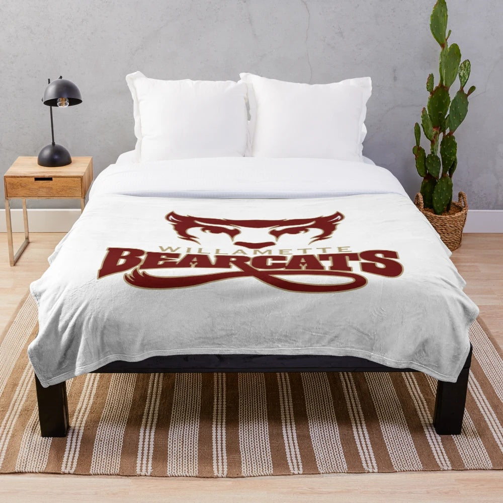 Soft and cozy plush blanket featuring the Willamette University Bearcats logo