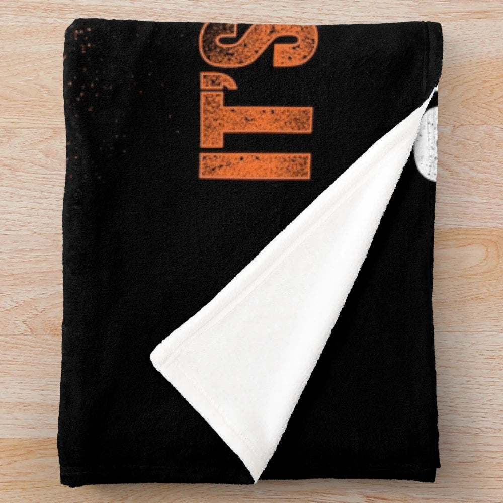 Plush blanket featuring a wrestling singlet design