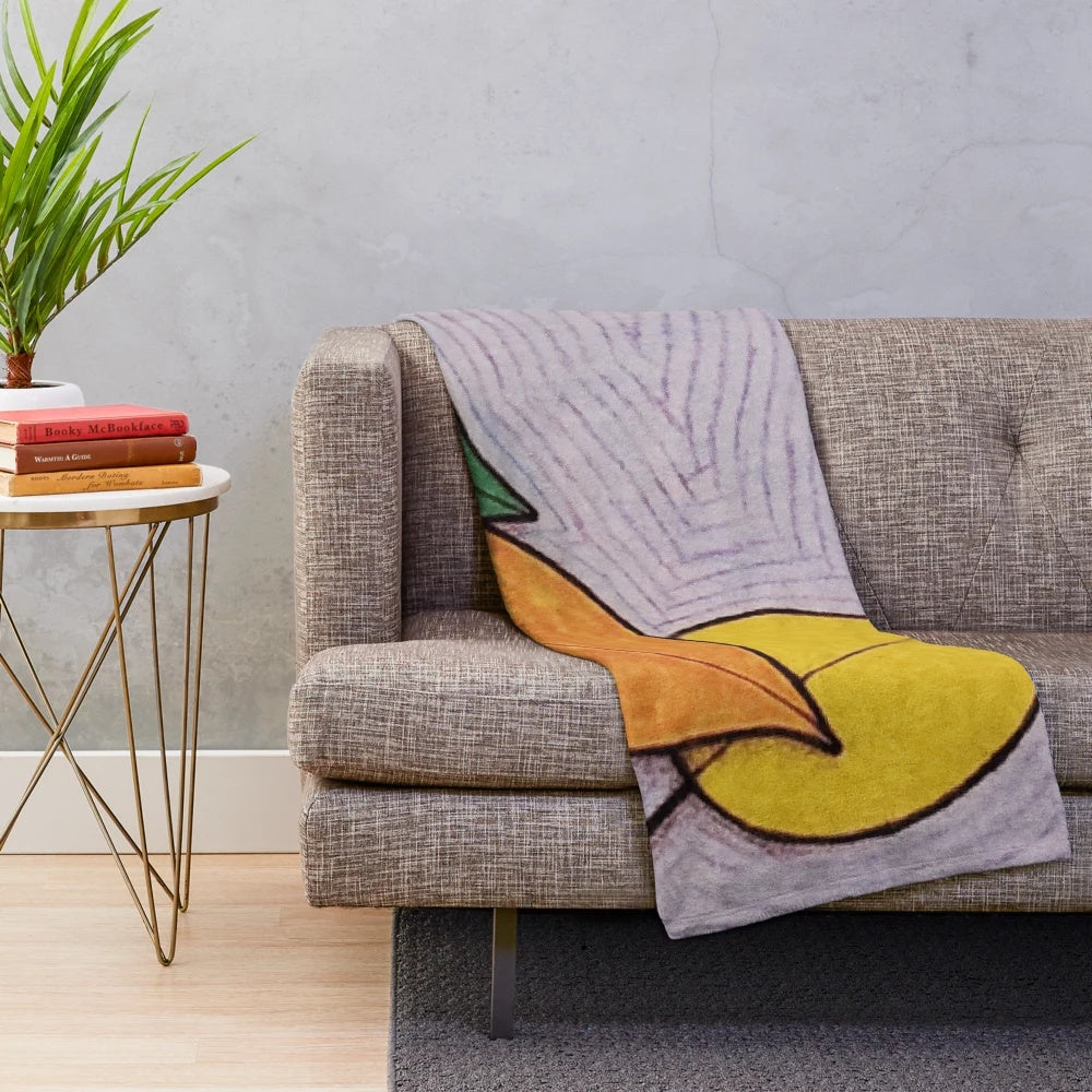 Plush blanket with a design of fall and winter scenes, honoring the memory of Pat J.