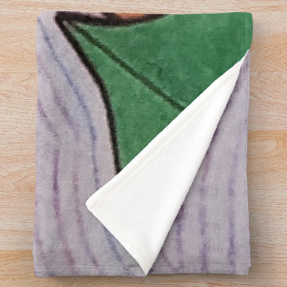 Plush blanket with a design of fall and winter scenes, honoring the memory of Pat J.