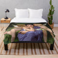 Plush blanket featuring cupid and psyche from Bouguereau's "Songs of Spring" painting