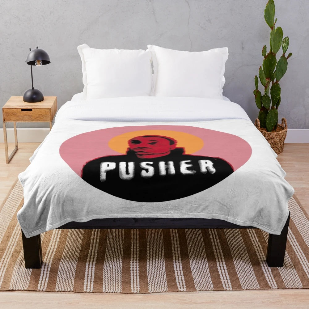 Plush blanket featuring religious and pop art imagery inspired by the Danish cult film "Holy Pusher