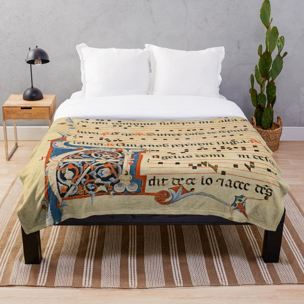 Plush blanket featuring intricate medieval musical manuscript design