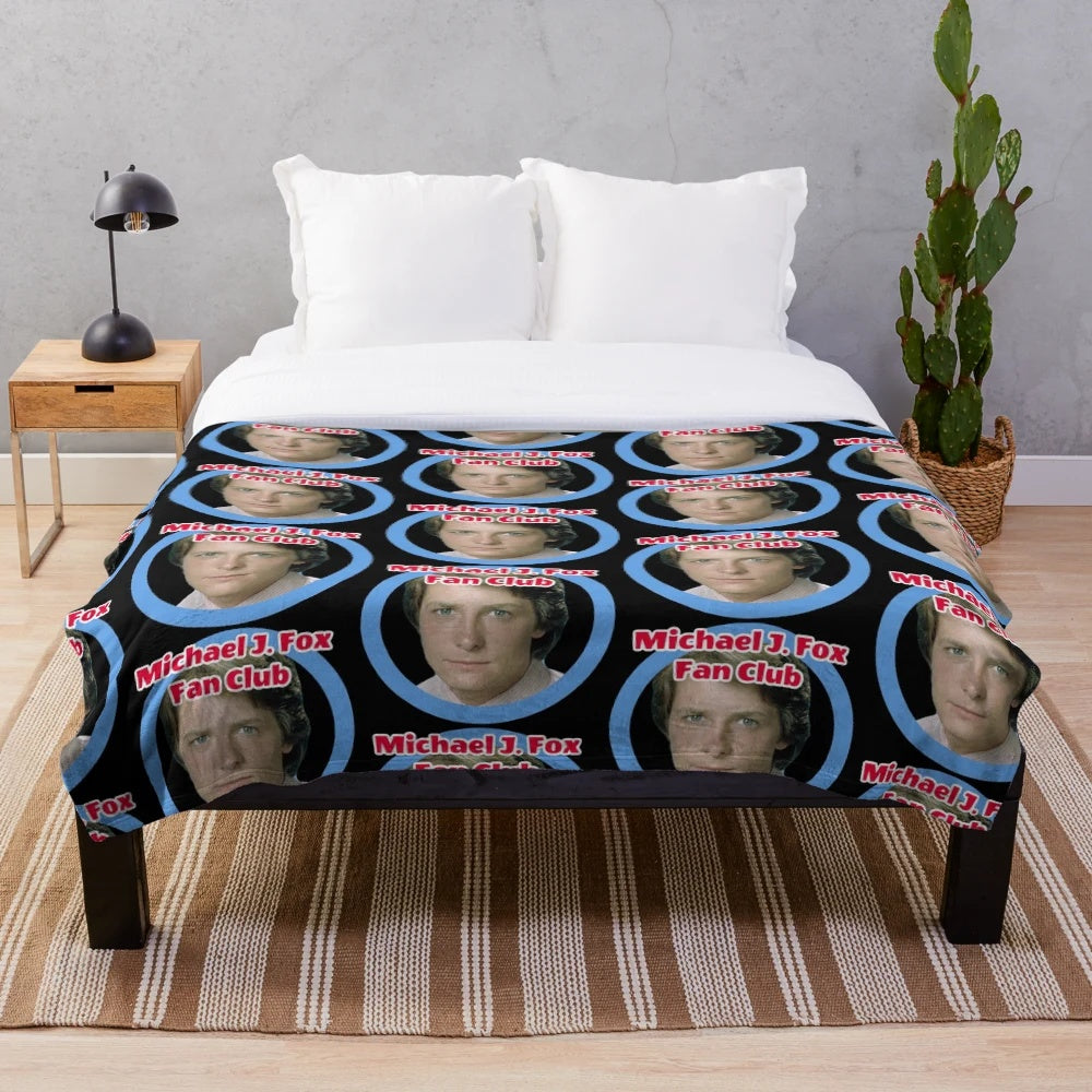 Plush blanket featuring Michael J. Fox, known for his roles in Back to the Future and other beloved films
