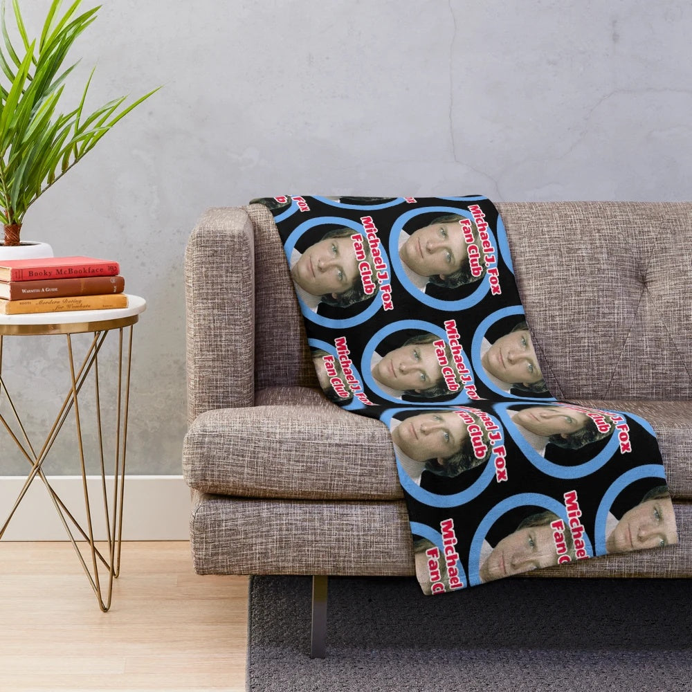Plush blanket featuring Michael J. Fox, known for his roles in Back to the Future and other beloved films