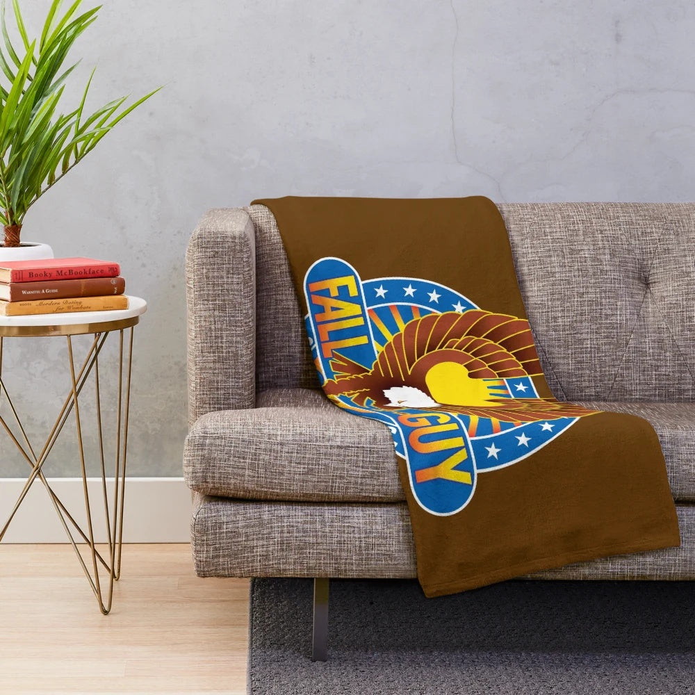 The Fall Guy plush blanket featuring stuntman Colt Seavers and his trusty 4x4 truck