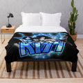 Plush blanket featuring the iconic KISS band members