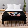 Plush blanket featuring the Take That logo