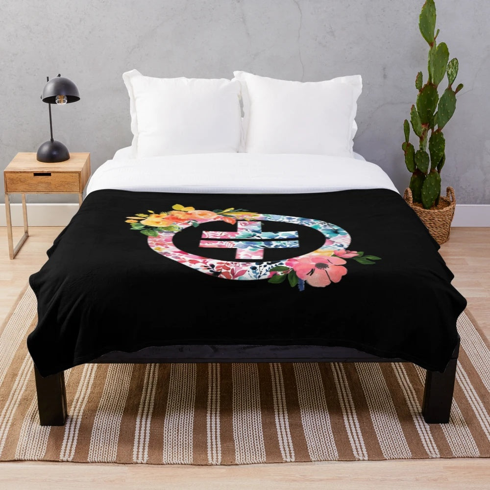 Plush blanket featuring the Take That logo