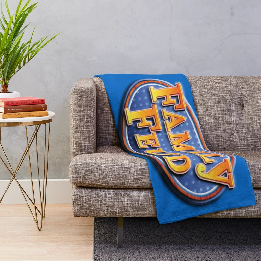 Soft, cozy plush blanket featuring the Family Feud game show logo and design