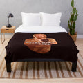 Plush blanket with "More Cowbell" design inspired by the popular SNL sketch