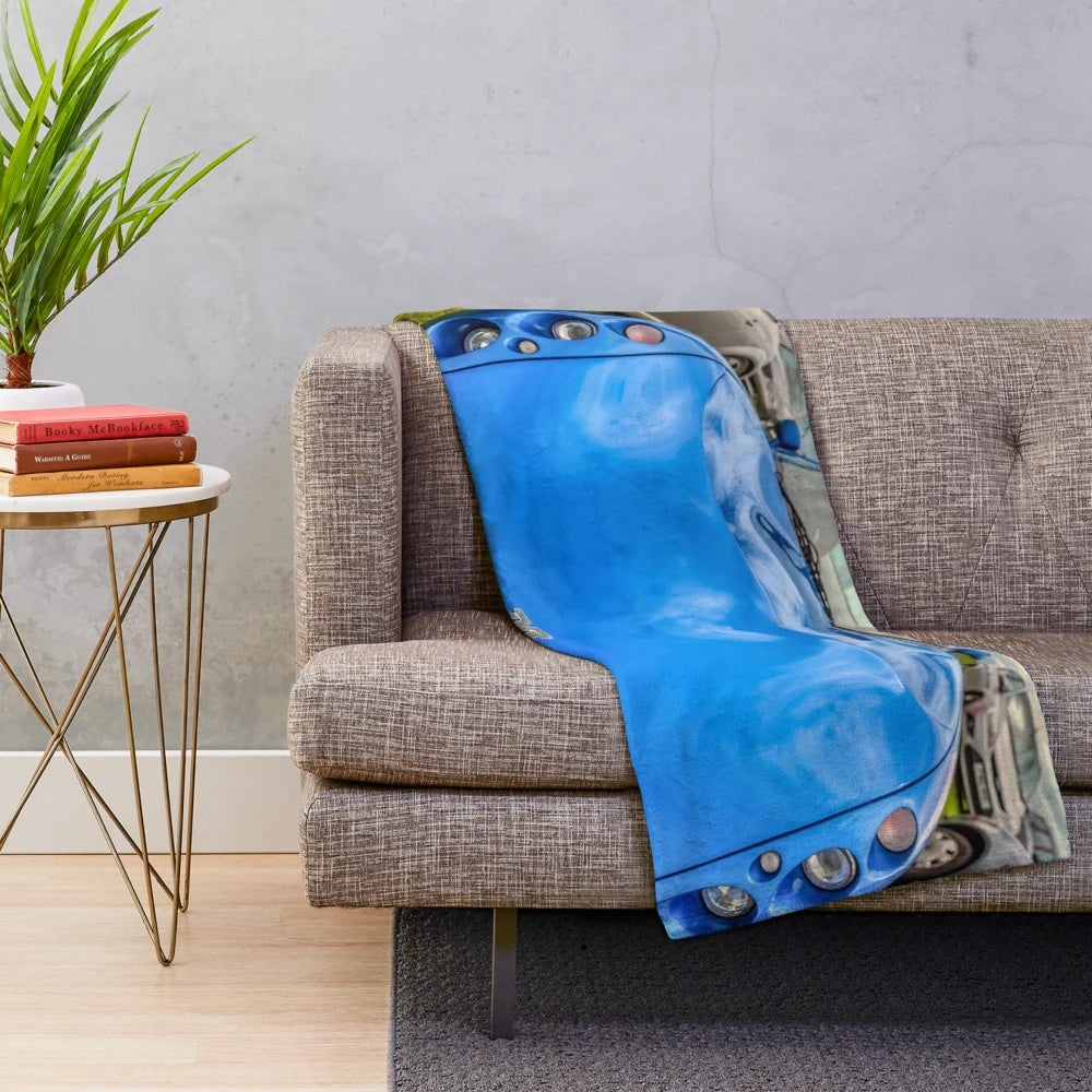 Plush blanket featuring the design of a TVR Tuscan British sports car