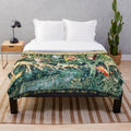 Plush blanket featuring a William Morris-inspired design with deer, foliage, and heraldic shields