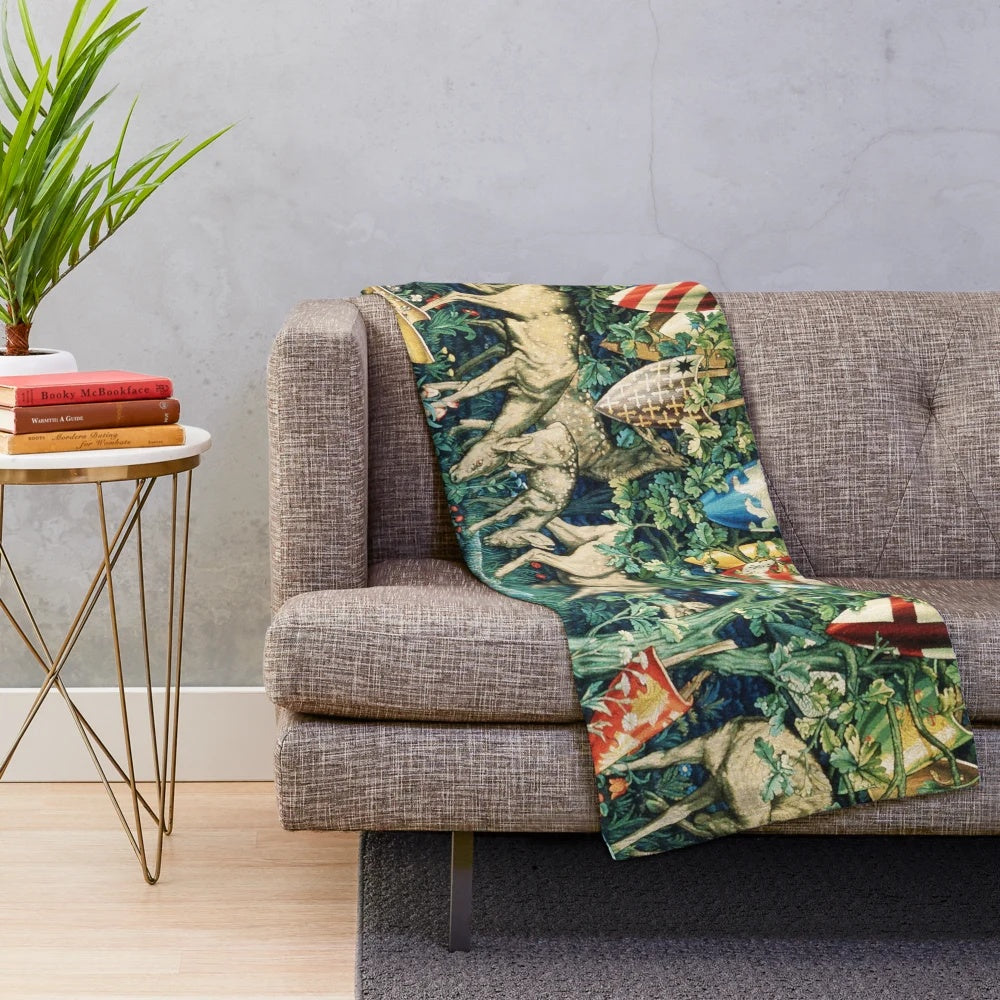 Plush blanket featuring a William Morris-inspired design with deer, foliage, and heraldic shields