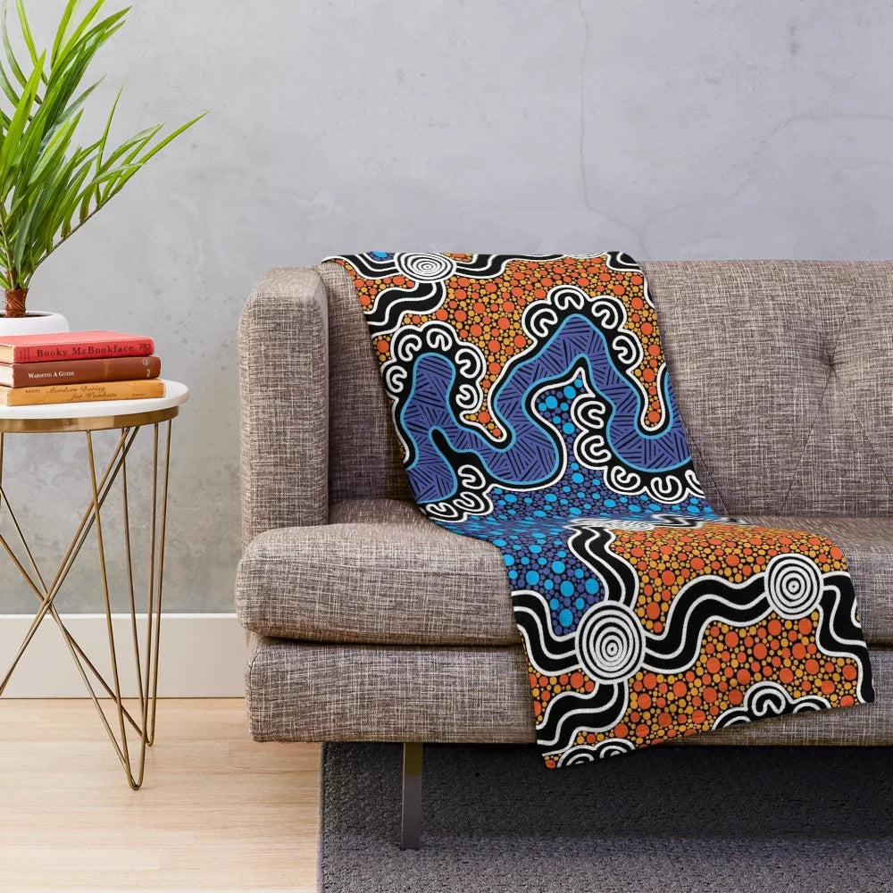Plush blanket with aboriginal-inspired nature-themed design