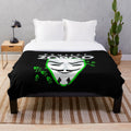 Plush blanket with anonymous mask design, perfect for coding and gaming enthusiasts