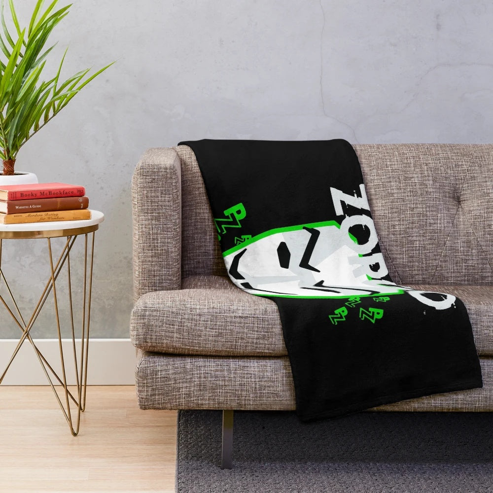 Plush blanket with anonymous mask design, perfect for coding and gaming enthusiasts