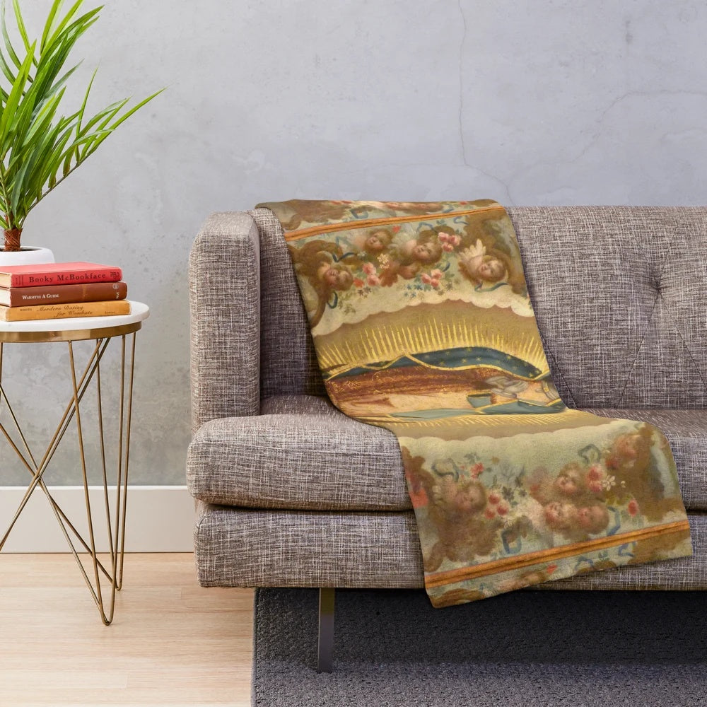 Plush blanket featuring artwork of Virgin of Guadalupe and her four apparitions
