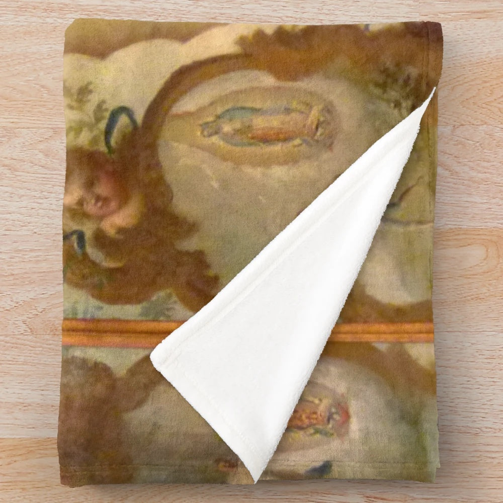 Plush blanket featuring artwork of Virgin of Guadalupe and her four apparitions