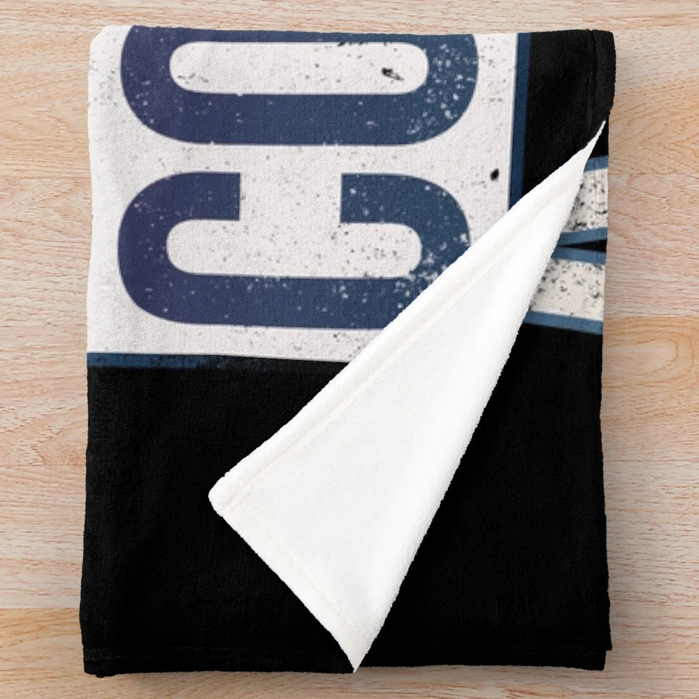 Plush blanket with "Ask Me About Coupons" design