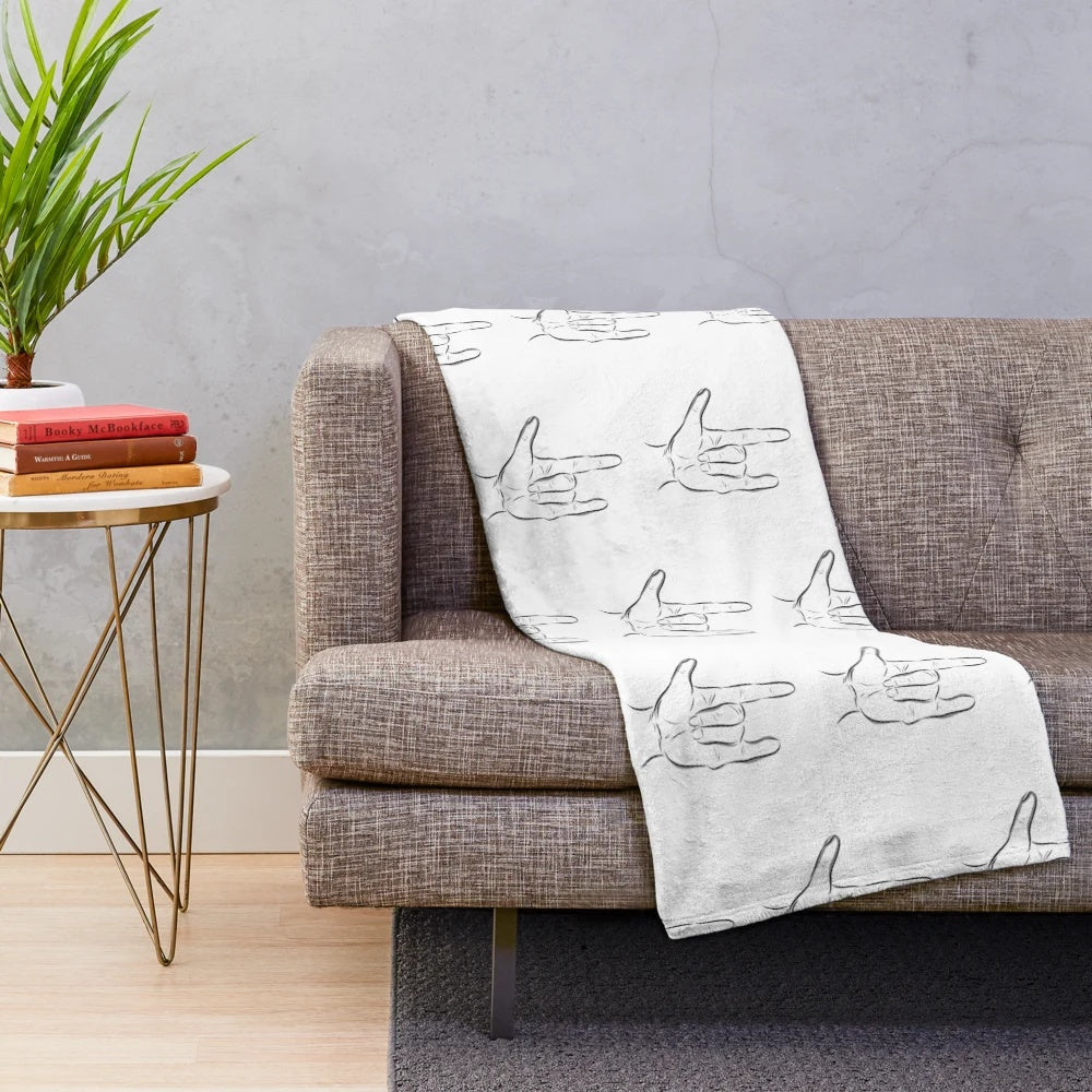 Plush blanket with illustration of American Sign Language hand sign