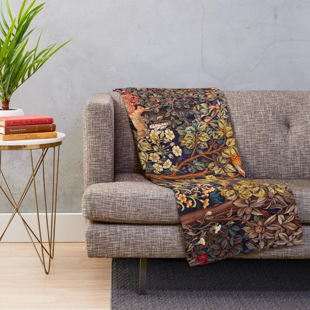 Plush blanket featuring autumn forest animals and floral tapestry design