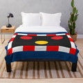 Plush blanket featuring British railway level crossing signal lights design