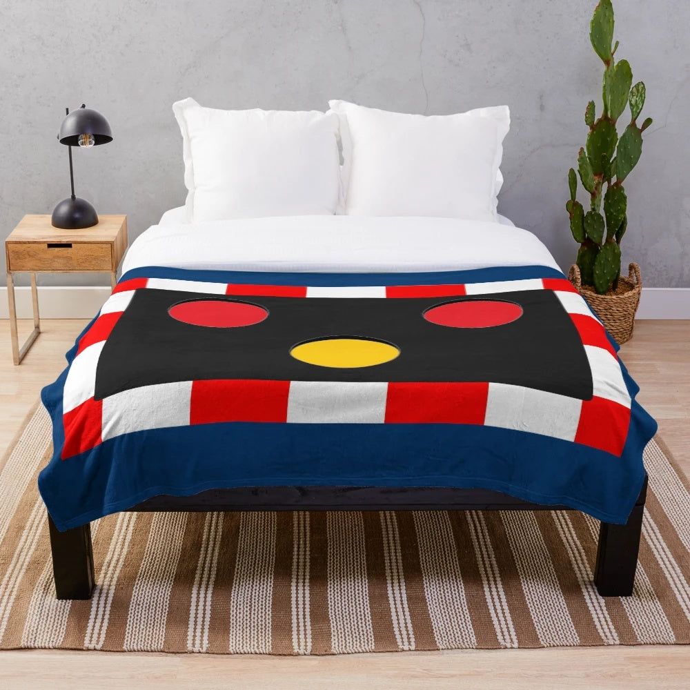 Plush blanket featuring British railway level crossing signal lights design