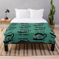 Plush blanket with conspiracy theory inspired designs